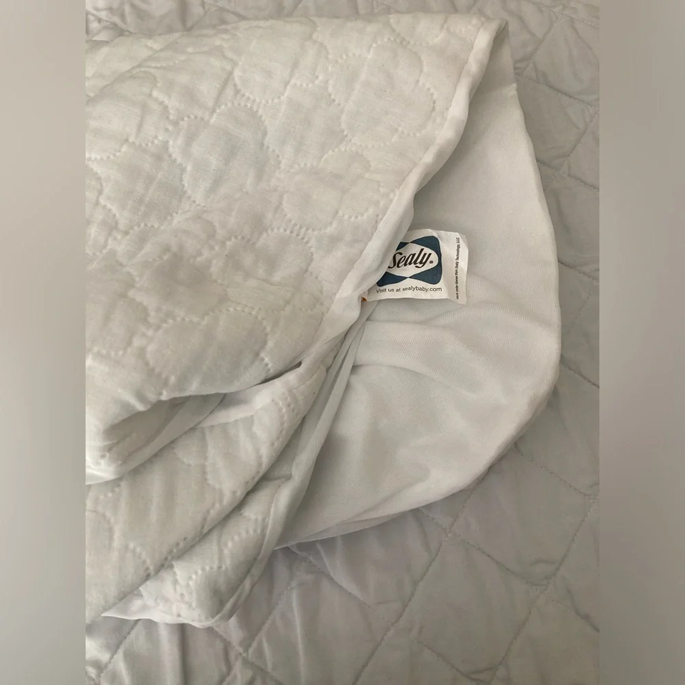 Sealy Total Stain Protection Waterproof Crib Mattress Pad.